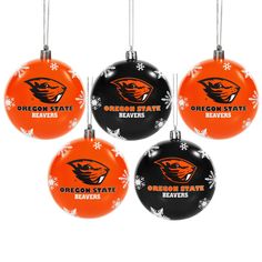 oregon state beavers ornament ornaments with snowflakes are shown in black and orange