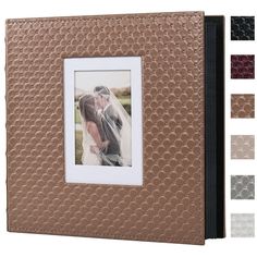 a brown leather photo album with an image of a bride and groom on the cover