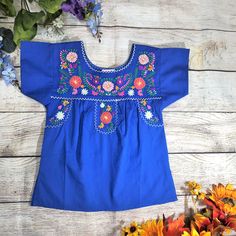 100% Cotton Super cute youth girls Mexican Blouse. High Quality Detailed Embroidery Perfect for special occasions or everyday wear Cute Multicolor Embroidered Tops For Spring, Cute Multicolor Embroidery Tops For Spring, Blue Tops With Machine Embroidery For Summer, Cute Multicolor Embroidered Tops, Girl Mexican, Mexican Blouse, Mexican Girl, Girls Blouse, Beautiful Blouses