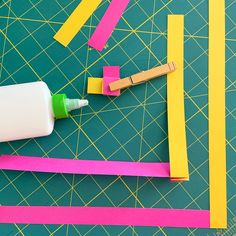 the crafting supplies are laid out and ready to be used for making paper strips