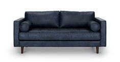 a black leather couch with wooden legs on a white background, it is isolated from the front view