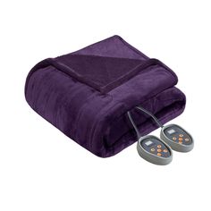 an electric blanket and two warmers on a white background