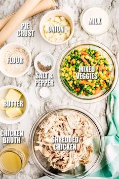 the ingredients to make chicken salad laid out on a marble counter top with text overlay