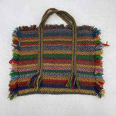 Vintage Woven Purse Bag Tassels Multicolor Fringe Striped Bohemian Hippie Retro In wonderful vintage condition!! Measurements- Side to side, not including the fringe part- 12.5 inches Top to bottom, not including the fringe- 11 inches Strap drop- 4 inches Bag Tassels, Woven Purse, Handwoven Bag, The Fringe, Tassel Bag, Bohemian Hippie, Hippie Bohemian, Woven Bag, Purse Bag