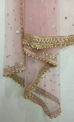 This is a Dupatta made on orders. It is made using net fabric with sequine embroidery all over. I can change color if required. We stitch beautiful golden laces to all sides of it. Dupatta is having a length of 100 inches and width of around 40 inches. I don't keep it readymade I only make it exclusively for my customers. Can be fully customised. Duppattas Designs Ideas, Dupatta Styling, Kameez Lehenga, Lehenga For Women, Designer Dupatta, Girls Party Wear, Golden Lace, Baby Pink Colour, Party Wear Lehenga