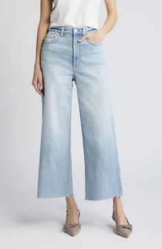 Frayed, ankle-grazing hems amp the '70s-meets-modern style of polished wide-leg jeans made from low-stretch denim. 27" inseam; 22 12" leg opening; 131/2" front rise; 15 1/2" back rise (size 29) Zip fly with button closure Five-pocket style 99% cotton, 1% spandex Machine wash, tumble dry Imported Frayed Hem Cropped Wide Leg Pants For Fall, Cropped Wide Leg Pants With Frayed Hem For Fall, Modern Light Wash Flare Jeans For Spring, Modern Wide Leg Cropped Jeans For Spring, Chic Wide Leg Pants With Frayed Hem, Modern Light Wash Spring Flare Jeans, Modern High Rise Bottoms With Frayed Hem, Modern Cropped Leg Flare Jeans For Spring, Spring Modern Cropped Leg Flare Jeans