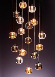 a chandelier with many glass balls hanging from it