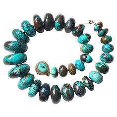 The length of the necklace is 19 inches (48 cm). The size of the rondelle beads varies from 16 mm to 33.5 mm. Turquoise ranges in color from a light shade of green to light blue to a beautiful dark blue. Turquoise beads have a dark brown or black matrix and a beautiful spider webbing. No thermal or other mechanical treatments were used. Genuine, stabilized, no color added, blue turquoise from Hubei Province of China. The necklace is fastened with a rare silver handmade clasp with a cabochon of n Hubei Turquoise, Necklaces Beaded, Vintage Beads Necklace, American Turquoise, Light Shade, Beaded Necklaces, Natural Turquoise, No Color, Blue Turquoise