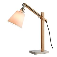 a wooden desk lamp with a white shade