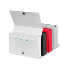 two binders in a white box with red and black file folders on top