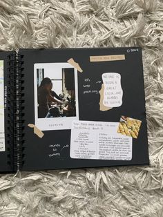 an open notebook with pictures and notes on it