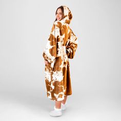 Hate having to get up and leave the warmth of a throw behind? Now you can wear the same super soft plush and patterns you love while staying warm throughout the house. Carstens Inc. | Carstens Inc. Premium Wearable Hooded Blanket Hoodie w / Pocket & Sleeves, Cow Print brown / whitePolyester | 36" W X 44" L | Wayfair Blanket Hoodie, Hooded Blanket, Cow Print, Get Up, Soft Plush, Stay Warm, Blankets & Throws, Cow, Multi Color