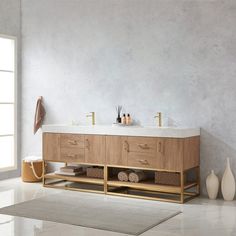 a bathroom with a sink, mirror and rug