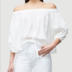 Details Frame Embroidered Top In Linen. Off-The-Shoulder Neckline. Three-Quarter Sleeves. Relaxed Fit. Slipover Style. Linen. Machine Wash. Color: White From Frame Embroidered Linen Off Shoulder Top Summer Perfect Linen And Shadow Stripes Put A Casual Spin On An Off Shoulder Top. Relaxed Fit, Balloon Sleeves, Elastic Finish At Top And Cuffs. 100% Linen. Machine Wash. 16.75" Long From Shoulder. Model Is 5'10" Tall/177cm And Is Wearing A Us Size S. Spring Cotton Off-shoulder Top, White Off-shoulder Blouse For Spring, Chic White Off-shoulder Top For Brunch, White Cotton Off-shoulder Top For Spring, Summer White Cotton Off-shoulder Top, White Cotton Off-shoulder Top For Summer, Linen Tee Shirt, Leopard Cami, Silk Halter Top