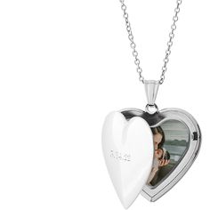 Made of stainless steel, with your choice of silver, gold or rose gold finish. Oval Locket measures 1.2 x 0.9, photo insert measures 0.9 x 0.6. Heart Locket measures 1.07 x 1.09, photo insert measures 0.8 x.85. Engraving available on front side only. Photos already sized and inserted inside. Comes with 18 coordinating chain and gift box. Imported. Personalized in USA Customizable Stainless Steel Heart Pendant Jewelry, Customizable Stainless Steel Keepsake Necklaces, Customizable Stainless Steel Necklace For Keepsakes, Customizable Stainless Steel Keepsake Necklace, Keepsake Heart Necklace With Stainless Steel Heart Charm, Double Heart Stainless Steel Jewelry For Personalized Gift, Stainless Steel Keepsake Necklaces For Valentine's Day, Stainless Steel Heart Necklace With Heart Charm For Keepsake, Personalized Silver Heart Necklace For Memorial