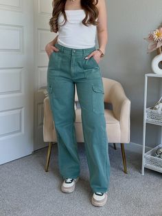 Our best selling cargo pants are back in a new style! The Luna high waisted cargo pants feature a relaxed, wide-leg fit in a gorgeous gray green color! They hit all the right places for a flattering fit that flatters your figure and keeps you feeling confident all day long. Functional pockets and belt loops add everyday ease. They're the perfect everyday pants that can be easily transformed from day to night! Get yours before they're gone! 100% Cotton Color: Gray green High waisted Wide leg Rela Cargo Pants Gray, High Waisted Cargo Pants, Wide Leg Cargo Pants, Everyday Pants, Camel Sweaters, Feeling Confident, Knitted Pullover Sweaters, Gray Green, Dress Romper