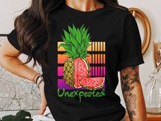 Unexpected Pineapple Watermelon T-Shirt. Available in an array of colors, you can fill your wardrobe with one two or three LOL This updated unisex essential fits like a well-loved favorite, featuring a crew neck, short sleeves and designed with superior combed and ring-spun cotton that acts as the best blank canvas for printing. Features Sideseamed. Retail fit. Unisex sizing. Shoulder taping. Fabrication: 100% Airlume combed and ring-spun cotton, 32 single 4.2 oz. (Ash - 99% Airlume combed and ring-spun cotton, 1% poly) Unexpected Pineapple Watermelon T-Shirt, Fruit Lover Shirt, Summer Tee, Summer Vibes Tee, Pineapple Lover Gift, Watermelon Lover Gift, Neon Watermelon T Shirt, Pineapple Watermelon, Pineapple Lovers, Summer Tee, Blank Canvas, Summer Vibes, Gift For Lover, Watermelon, Pineapple