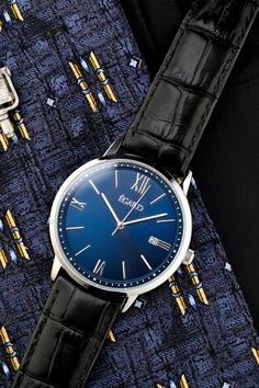 A Egard classic. This classic 40MM men's 3-hand automatic watch is made modern with a bold case and minimalist dial. Featuring a sapphire crystal, 5 atm water resistance, a Miyota automatic movement and a gorgeous blue sunburst dial. Sapphire Crystal, Men's Collection, The Man, Gentleman, Sapphire, Stainless Steel, Leather