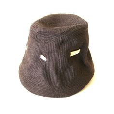 "Cute and stylish brown wool DESIGNER hat. It is made of quilted fabric and has a satin ribbon running through it. The ribbon ties into a bow at the back. There is a wire at the brim to give it structure and a subtle scallop to the edge of the brim. Embroidered tag reads: Solange de Fabry 33 Rue de Ponthieu PARIS Measures: It is 6-1/2\" tall which give 4\" to the crown and 2 1/2\" to the brim although the brim is not highly defined. Inside circumference: Approx. 21 1/2\" (measuring along the sew 1950s Hat, Hand Tooled Leather, Silver Shoes, Cute Hats, Wool Hat, Brown Fashion, Vintage Brown, Hat Band, Leather Tooling