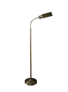 a lamp that is on top of a metal stand with a white light behind it