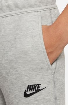 Lightweight Tech Fleece brings warmth without added bulk to kid-size joggers made with handy pockets and a vibe that's perfect for playing or relaxing. Drawstring waist Front zip pockets 52% cotton, 48% polyester Machine wash, dry flat Imported Fleece Women, Nike Sportswear Tech Fleece, Nike Sportswear Club Fleece, French Terry Shorts, Wide Leg Sweatpants, Nikes Girl, Nike Tech Fleece, Terry Shorts, Shorts Nike