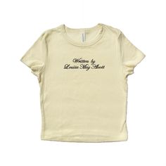 Baby tee with "Written by [Author Name]" embroidered in polyester thread. T-shirt will feature the font and colors shown in example photos. Available in natural w/ black lettering and black w/ pink lettering. A thoughtful gift for your bestie that loves to read. <3 Soft, mid-length shirt for the perfect baby tee fit! Fabrication: 52% Airlume combed and ring-spun cotton, 48% polyester 32 single, 5.4oz Want a different embroidery color? Message us! We have a large variety of colored thread to choose from. Fitted T-shirt With Embroidered Text And Short Sleeve, Fitted Crew Neck T-shirt With Custom Text, Embroidery Placement, Palm Bay, The Fourth Of July, Baby T Shirts, July 3, National Anthem, Graphic Tees Women