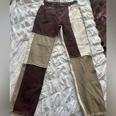 Patchwork Pants Never Worn Not Very Stretchy Fits Like A Size 8 Long Very Long, I’m 6’ And They Hit The Floor Brown Patchwork Wide Leg Bottoms, Casual Beige Patchwork Pants, Fitted White Bottoms With Patchwork Details, Beige Patchwork Pants For Spring, Brown Patchwork Long Pants, White Patchwork Long Pants, High Waist Cotton Patchwork Pants, High Waist White Pants With Patchwork, White High Waist Patchwork Pants