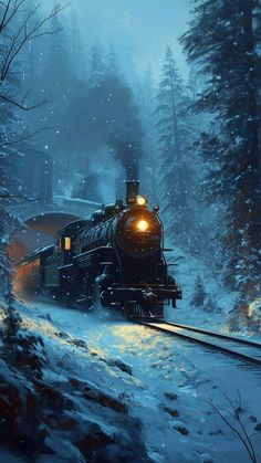 a train traveling through a snow covered forest at night with the lights on and trees in the foreground