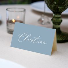 a place card sitting on top of a table