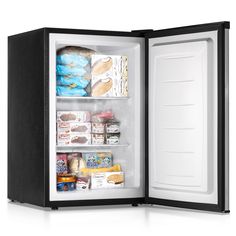 an open refrigerator with food and drinks in it on a white surface, showing the door