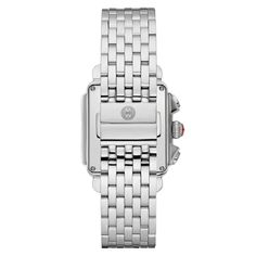 Inspired by the geometric shapes of Art Deco architecture, the Michele Deco Diamond watch embodies everyday elegance and is hand-set with 120 diamonds. 35mm rectangular stainless steel case Silver-tone mirror dial with 12 diamonds and Swiss chronograph movement Seven-link stainless steel bracelet with push-button deployment clasp; interchangeable with any 18mm Michele strap Modern Silver Watch With Rectangular Dial, Luxury Diamond Watch With Rectangular Stainless Steel Dial, Modern Silver Watches With Rectangular Dial, Modern Silver Diamond Watch Accessories, Modern Rectangular Watches With Metal Dial, Silver Square Watch With Metal Dial, Luxury Square Business Watch, Luxury Square Watch With Diamond Hour Markers, Business Diamond Watch With Metal Rectangular Dial