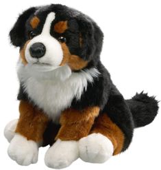 a stuffed dog is sitting on the floor