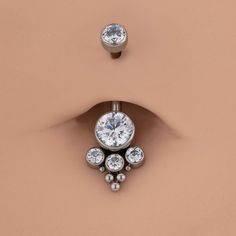 This internally threaded clear CZ gems titanium belly button ring is heavily adorned with clear CZ gems. It's classic, vibrant and gorgeous. It is made of ASTM F-136 titanium, which is a safe and reliable material for sensitive skins. It also provides comfort and protection against corrosion and tarnishing. Titanium Belly Ring, Titanium Belly Button Rings, Ring Day, Conch Hoop, Dangle Belly Rings, Dragon Claw, Skull Hand, Stainless Steel Hinges, Belly Piercing