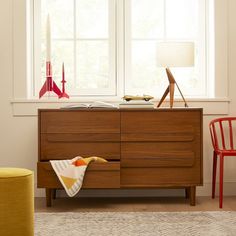 a living room scene with focus on the dresser