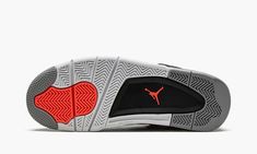 the jordan air jordan basketball shoe is shown in grey and red, with an orange sole