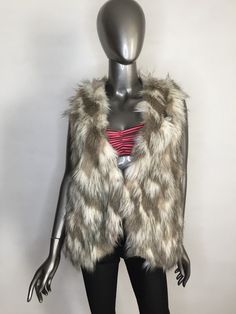 "Handmade women's faux fur vest, vegan vest, original short vest, spotted print in beige tones; fur is clean, without smell, without defects; fur vest has a free design, the length vest to the hips, ideal for jeans and dresses of any length, looks great with everyday clothes, also perfectly complements the festive clothes, suitable for special events and for theatrical performance; the fur vest is great for any season of the year, especially suitable for cold weather, in very good condition, wit Sleeveless Faux Fur Vest For Fall, Sleeveless Fur Coat With Faux Fur Lining For Fall, Sleeveless Fur Coat With Faux Fur Trim For Fall, Sleeveless Faux Fur Coat For Fall, Winter Faux Fur Vest With Fur Trim, Fitted Winter Vest With Faux Fur Trim, Winter Faux Fur Vest With Trim, Fitted Faux Fur Vest With Faux Fur Lining, Sleeveless Fur Coat With Faux Fur Trim