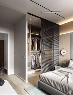 a bedroom with a bed and closets in it