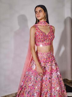 Editor's Note Featuring A Paisley Pattern Lehenga With Mirror And Foil Embroidery All Over. It Has A Matching Blouse And Self Color Net Dupatta. Fabric: Net Color: Pink Care: Dry Clean Only About the Designer Label Aneesh Agarwaal offers regal Indian designs developed with a modern asthetic for the discerning Indian Woman. Colorful Lengha, Sabyasachi Lengha, Mehndi Lehenga, Colorful Lehenga, Aneesh Agarwaal, India Outfits, Mirror Lehenga, Lehenga Ideas, Lengha Blouse Designs