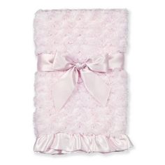 a pink blanket with a bow on the front and back of it's cover