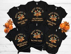 Looking for a cute, funny, matching set of cute black Thanksgiving tee shirts for all the family big and small Thanksgiving 2023?  This trendy group of crewneck shirts are perfect for for Thanksgiving dinner, or watching or watching football on the tv!  There are matching adult, youth, toddler tshirts and baby bodysuits, all sold separately.  These are a great way to celebrate a new family, baby's first thanksgiving  too! This delightful gag holiday crewneck tshirt set also makes a great gift for the grandkids, or for a matching couples set too!  They are great for putting with pajama bottoms for a matching family group, or for heading out for a full Thanksgiving party or for lounging on the holidays.  Spread a little holiday spirit wherever you go while being comfortable and looking great Family Matching Black Shirt With Funny Print, Black Tops With Funny Print For Family Matching, Family Matching Black Tops With Funny Print, Black Family Matching Tops With Funny Print, Family Matching Black Tops For Fall, Black Family Matching Tops For Fall, Novelty Black Tops With Funny Text, Funny Text Tops For Family Occasions, Black Tops With Funny Text For Family Matching