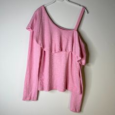 Great Transitional Piece For Fall With Dramatic Ruffle & One Shoulder Style. Pullover Style With Large Ruffle Along Neckline, Soft Pink, 100% Cotton. Size Xl. New With Tags. Original Price $58. Length: 24" Armpit To Armpit 20" This Item Has Is Stored And Shipped From A Smoke Free Home. Please Check All Photos For Item Condition, All Imperfections Will Be Documented. Thanks For Stopping By! All Items Are Shipped Within Three Business Days. Create A Bundle And Save On Shipping. A-023 Anthropologie Feminine Pink Knit Top For Spring, Spring Knit Top For Loungewear, Casual Off-shoulder Knit Top For Spring, Spring Casual Off-shoulder Knit Top, Pink Off-shoulder Top For Brunch, Flirty Pink Off-shoulder Tops, Cold Shoulder Styles, Anthropologie Top, One Shoulder Tops