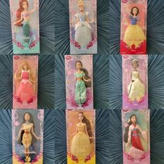 six princess dolls in their packaging on a blue background