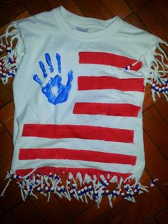 a t - shirt with an american flag painted on it