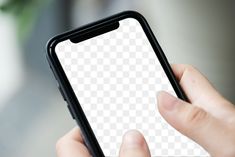 a person holding a cell phone in their hand with a white screen on the back