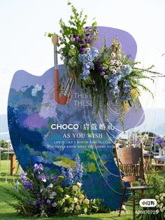 an advertisement for the chocolate company with flowers and watering equipment on it's back