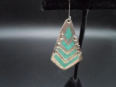 "2\"long drop 2.50 with hook 1\" wide at widest point Gradual width from .50\" to 1\" Indian design Inlaid turquoise and marked sterling silver Very good Vintage condition   Ever so slight crease on  last tear note corner. Ultimate design Indian Marked Sterling Mexico Free shipping" Southwestern Green Sterling Silver Earrings, Turquoise Dangle Jewelry Stamped 925, Silver Patina Drop Earrings, Silver Drop Earrings With Patina, Sterling Silver Patina Earrings, Turquoise Soldered Sterling Silver Earrings, Single Earring, Indian Design, Silver Turquoise