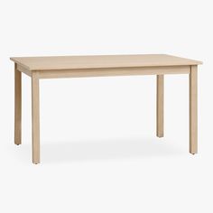 a wooden table on a white background with no people around it or in front of the table