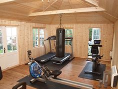 a home gym with cardio machines and exercise equipment