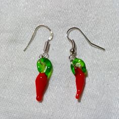 These Are Handmade, Lovely, And Adorable, Little Chili Pepper Earrings! They Are So Dainty. They Are Hand-Blown Lampwork Glass So Each One Is Different. The Red And Green Chili Peppers Measure Approximately 1/2" In Length So The Earrings In Total Are About 1 1/8". I Hope You Like These As Much As I Do. I Make Sell Jewelry Here, And There Is A Necklace That Matches This In My Closet! Thanks For Stopping By, And Feel Free To Leave Me A Fair Offer. :) Casual Red Earrings For Party, Casual Red Party Earrings, Handmade Red Casual Earrings, Casual Red Nickel-free Earrings, Handmade Casual Red Earrings, Pepper Earrings, Green Chili Peppers, Sell Jewelry, Gold Diamond Hoop Earrings