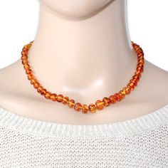 Vintage Knotted Baltic Amber Bead Necklace. Acquired From A Private Estate Collection, This Beaded Necklace Features Genuine Amber Beads With A Gorgeous Honey Orange Color And Natural Inclusions. Each Bead Is Unique With An Organic Oblong Shape. There Is A Handmade Knot In Between Each Bead To Protect From Abrasion And Create A More Fluid Drape. Lobster Clasp Closure. 16” Length. Excellent Pre-Owned Condition. Amber Bead Necklace, Amber Beads, Baltic Amber, Bead Necklace, Lobster Clasp, Womens Jewelry Necklace, Orange Color, Size 16, Knot